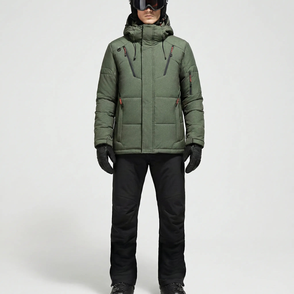 Padded ski jacket and snow pants set in dark green with black pants, hooded.