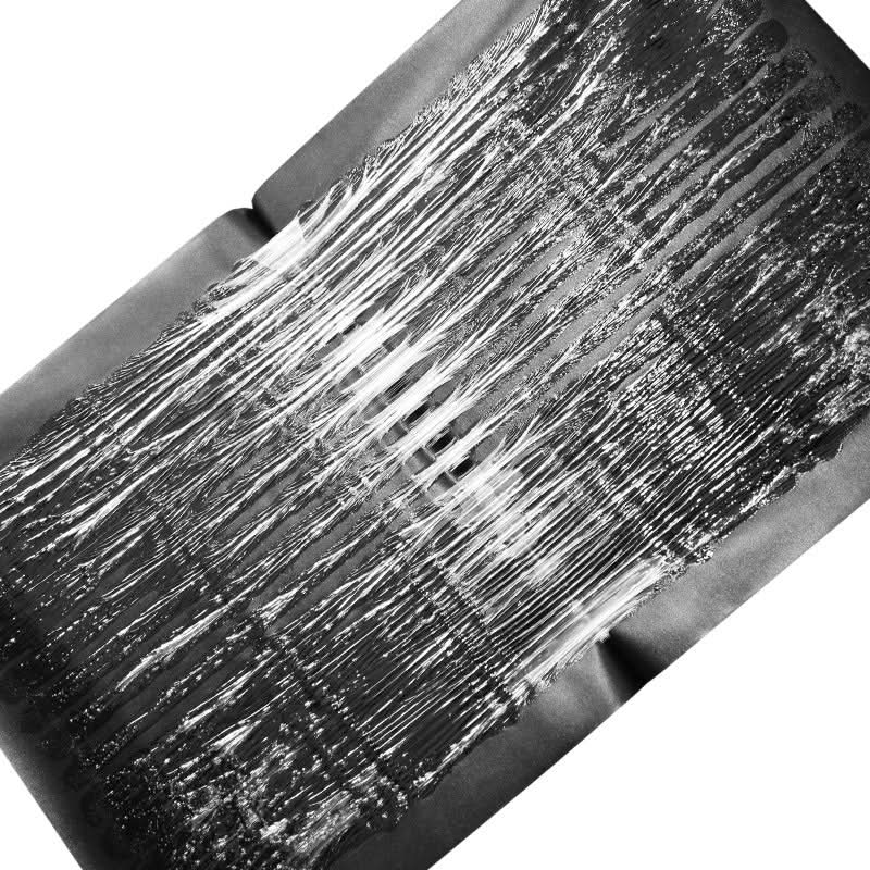 Rolled black adhesive glue trap sheet with thick clear sticky coating