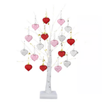 White birch tree stand with hanging pink, red, and gray heart ornaments