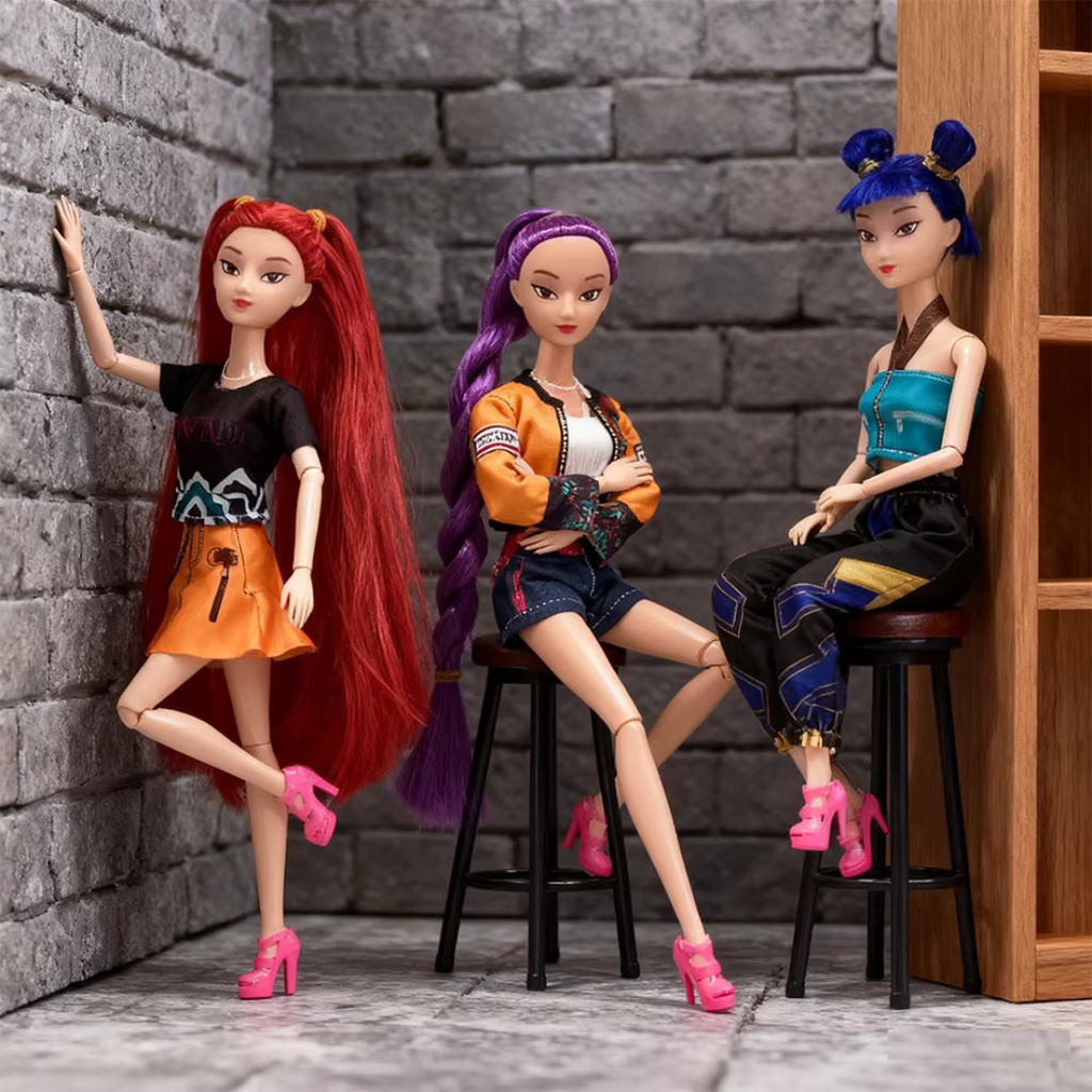 Set of 3 fashion singing dolls seated on stools: red, purple, and blue hair with pink shoes