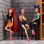 Set of 3 fashion singing dolls seated on stools: red, purple, and blue hair with pink shoes