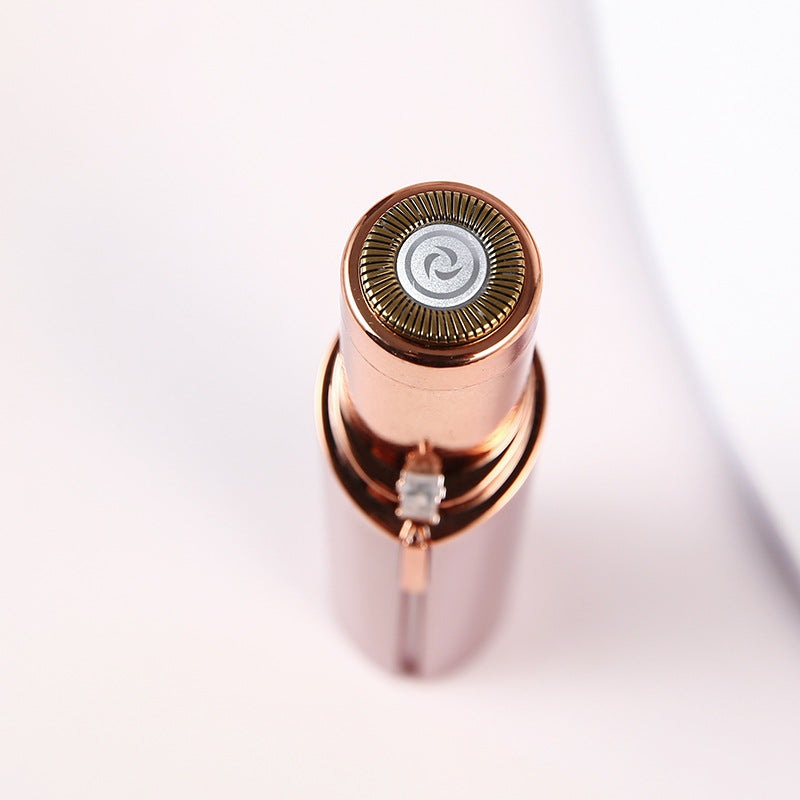 Rose gold facial hair remover head with rotating circular trimming blades