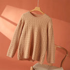 Beige textured long-sleeve sweater with crew neck and raised knit pattern
