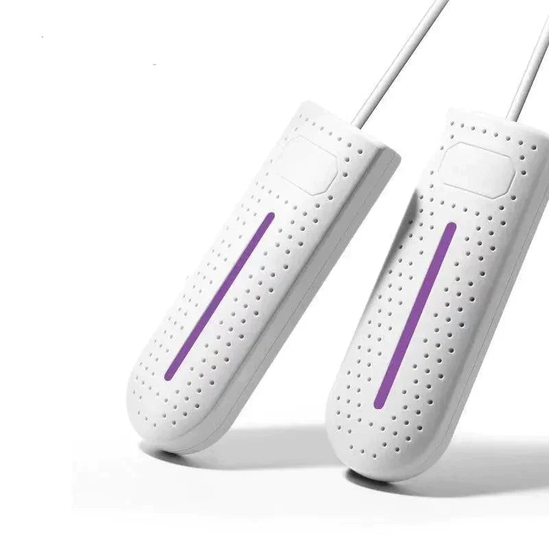 White shoe dryers with purple heating bars, two U-shaped units with cords.
