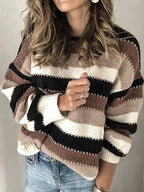 Women’s striped loose sweater in brown, cream, and black