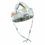 Children's headband with bear pattern on a pastel landscape background