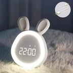 White bunny-shaped kids alarm clock with LED night light and digital time display