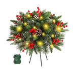 Lighted Christmas wreath planter insert with green foliage, red ornaments, and glowing yellow LEDs