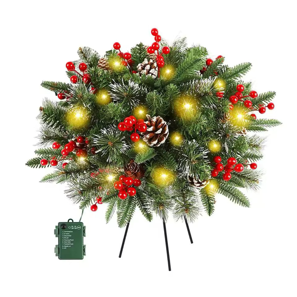 Lighted Christmas wreath planter insert with green foliage, red ornaments, and glowing yellow LEDs