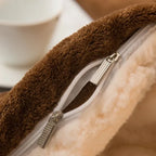 Double-sided flannel and fleece throw, brown fleece edge with zipper detail