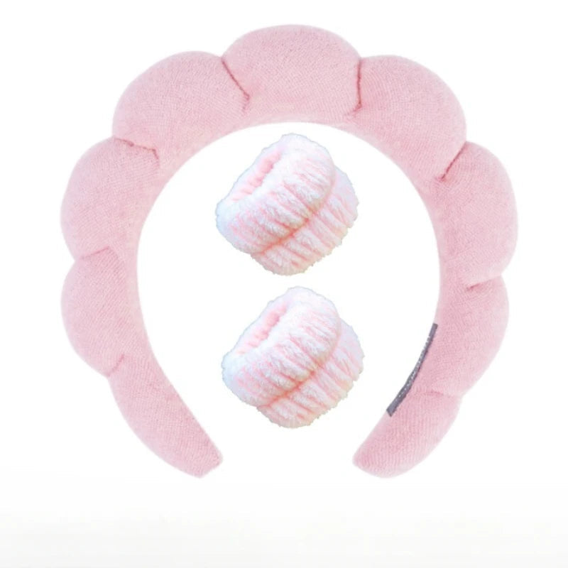 Pink plush spa headband with two matching fuzzy wrist towels for face washing