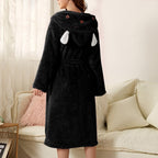 Black plush robe with bunny-hood ears, tied waist belt, back view