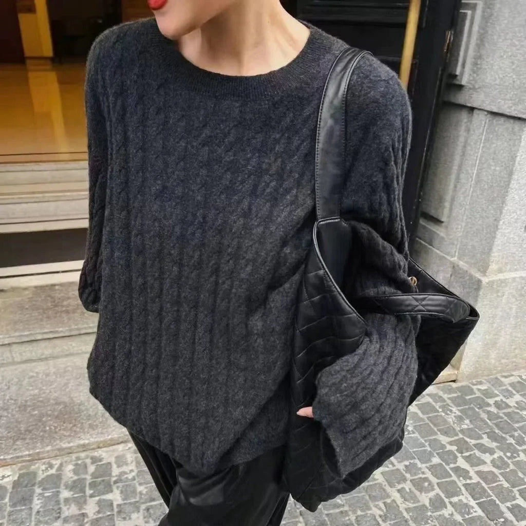 Dark gray textured long-sleeve sweater with crew neck and relaxed fit