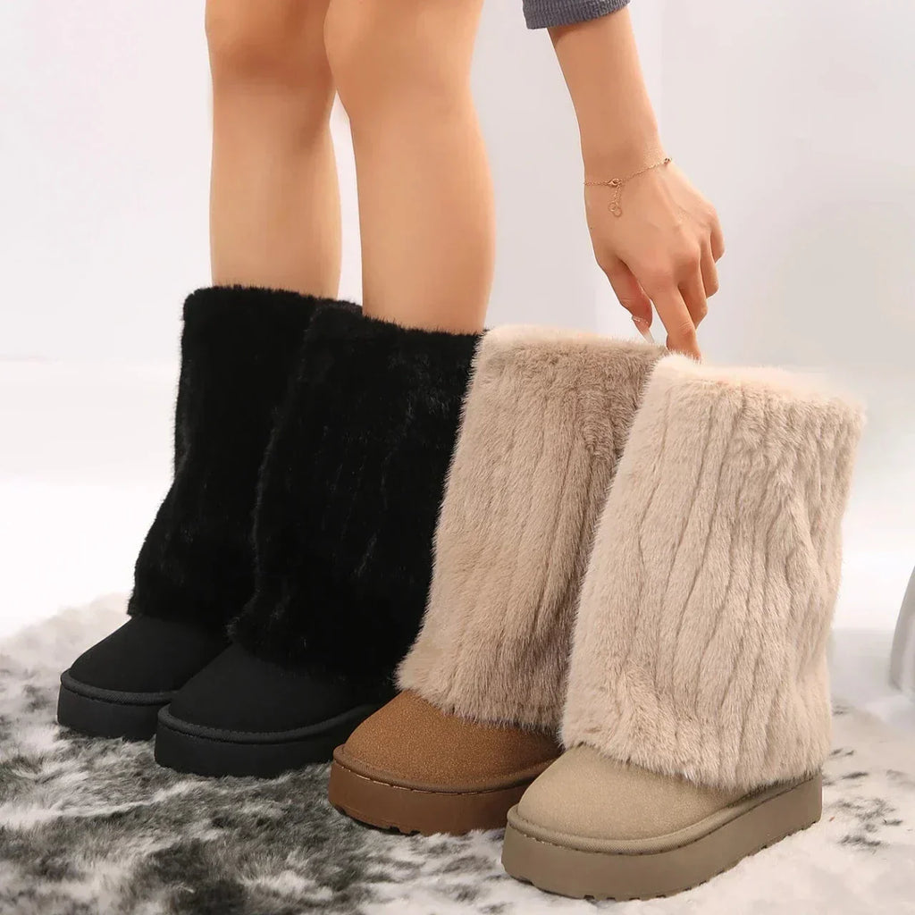 Black and beige knee-high platform lug boots with fuzzy cuffs and chunky rubber soles