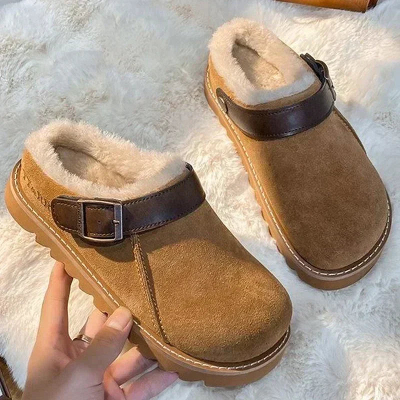 Brown suede fleece-lined mules with front buckle strap and thick sole