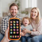 Child's toy phone with colorful app icons held by a hand, with two adults and a child in the background.