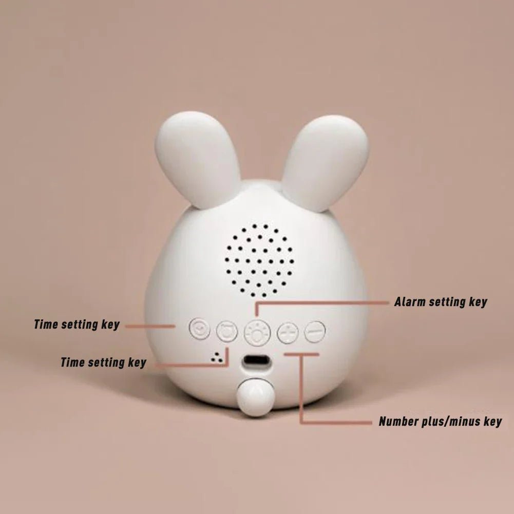 White bunny-shaped kids alarm clock with LED night light and control buttons
