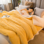 Golden yellow double-sided flannel and fleece throw blanket with plush sherpa trim