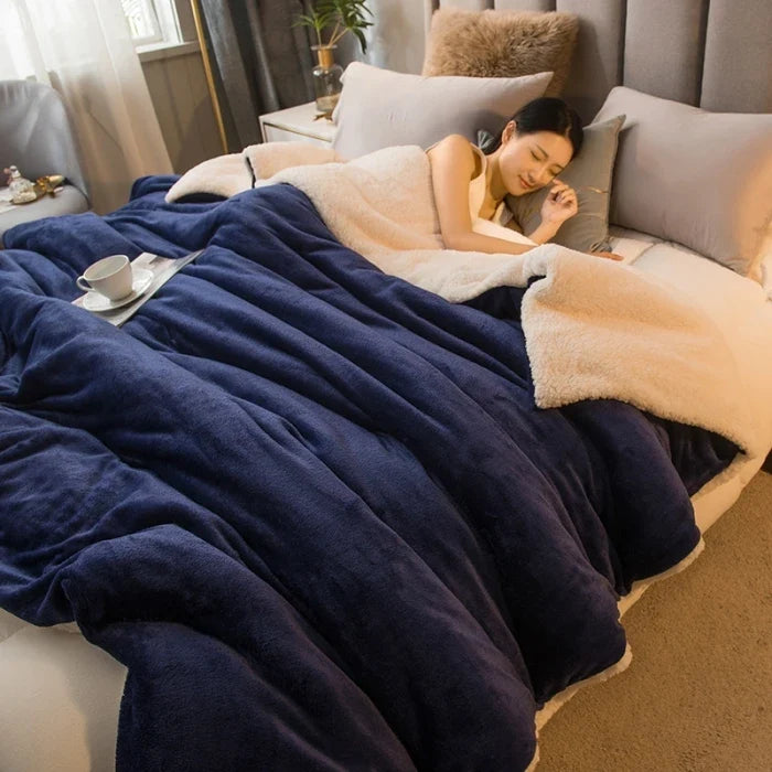 Navy blue double-sided flannel and fleece throw blanket with plush sherpa trim
