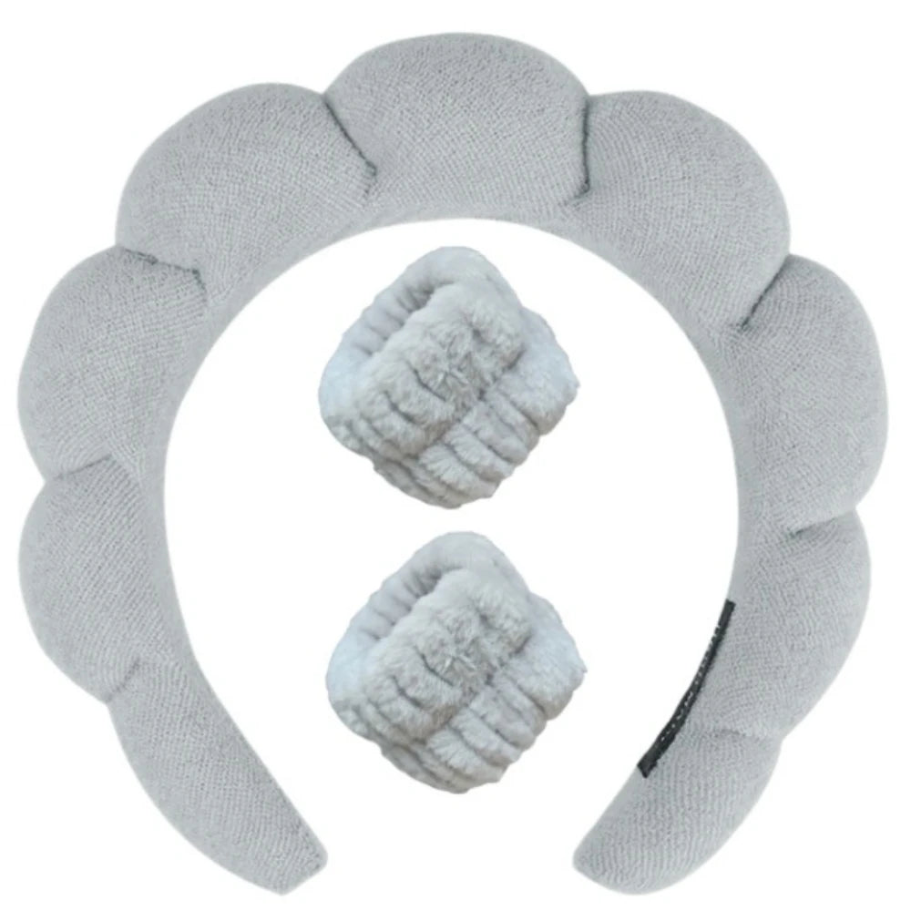 Gray plush spa headband set with two matching wrist towels for face washing.