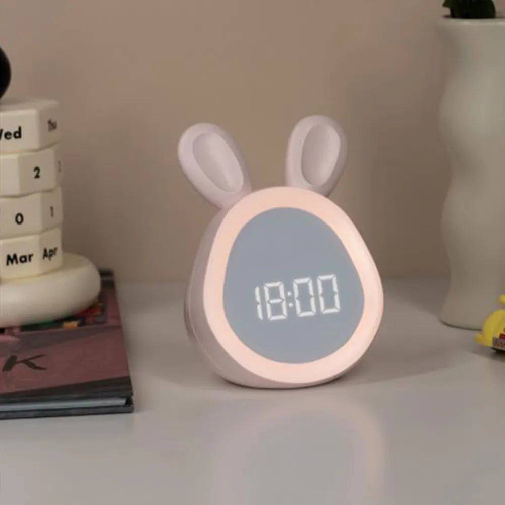 White bunny-shaped kids alarm clock with LED night light and digital time display