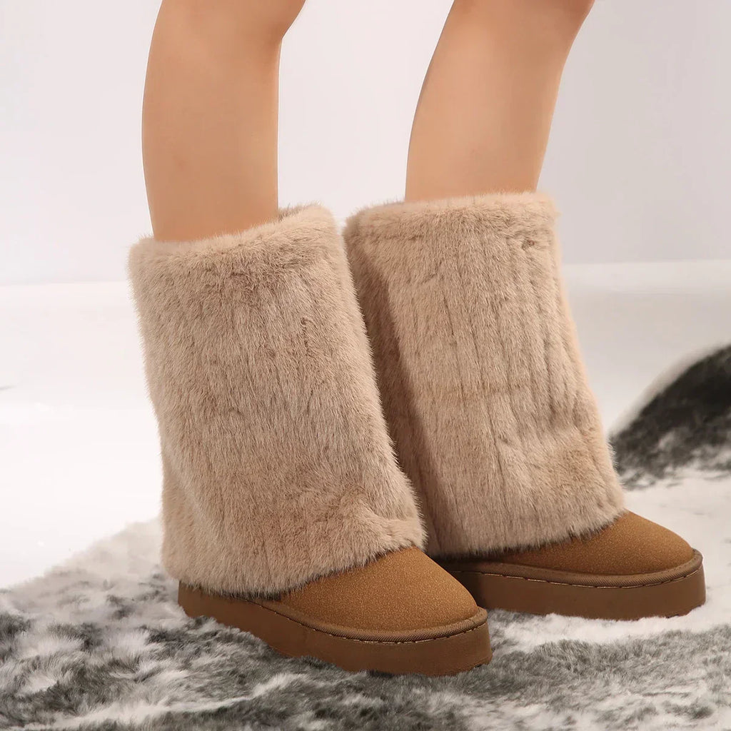 Tan knee-high platform lug boots with fuzzy cuffs and brown wedge-like lug soles