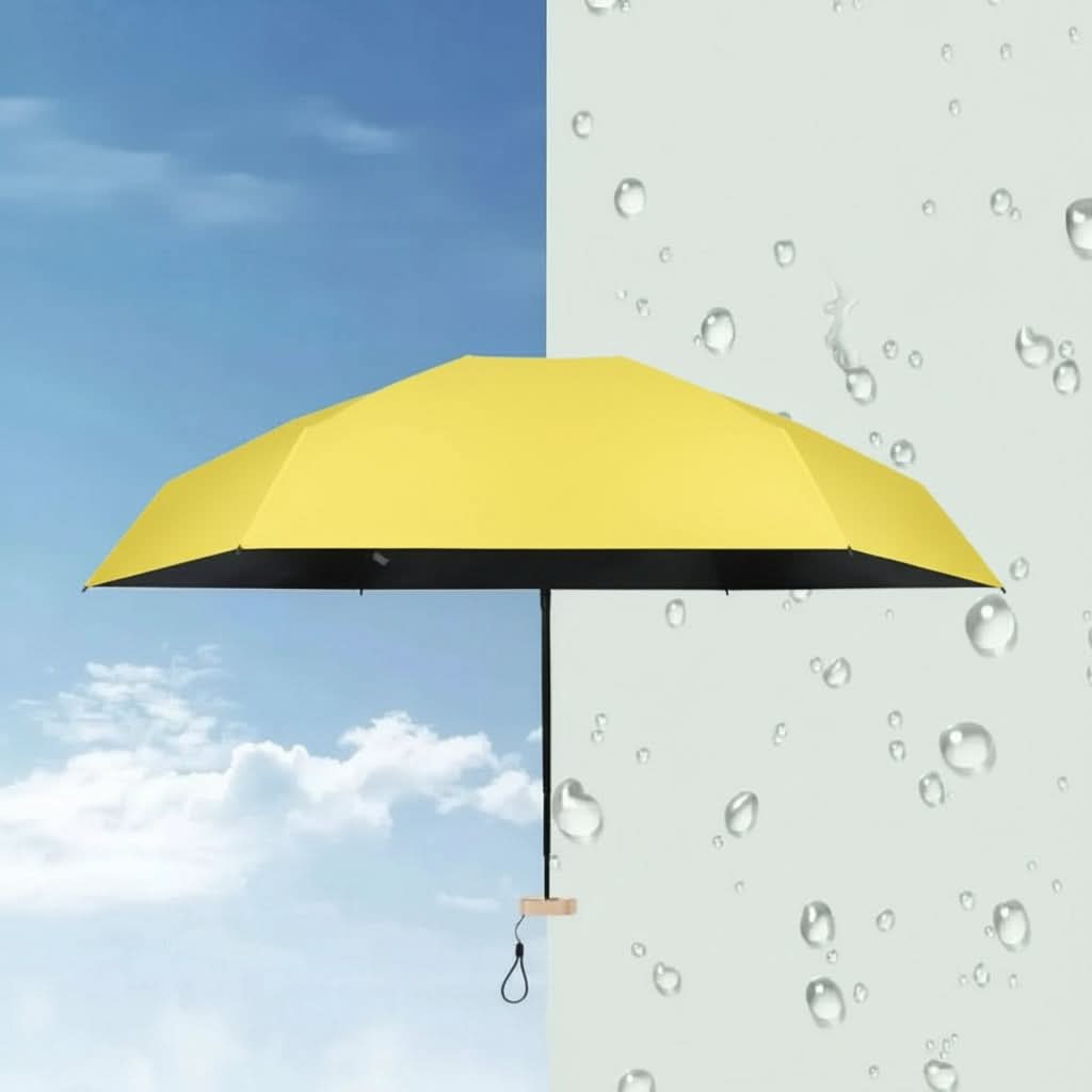Compact travel umbrella, open yellow canopy with water droplets