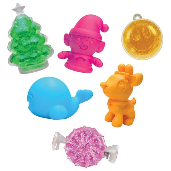 Colorful squishy fidget surprises and charms, including tree, whale, and coin tag