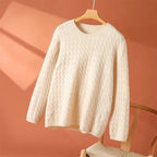 White textured long-sleeve sweater with crew neck and textured cable pattern