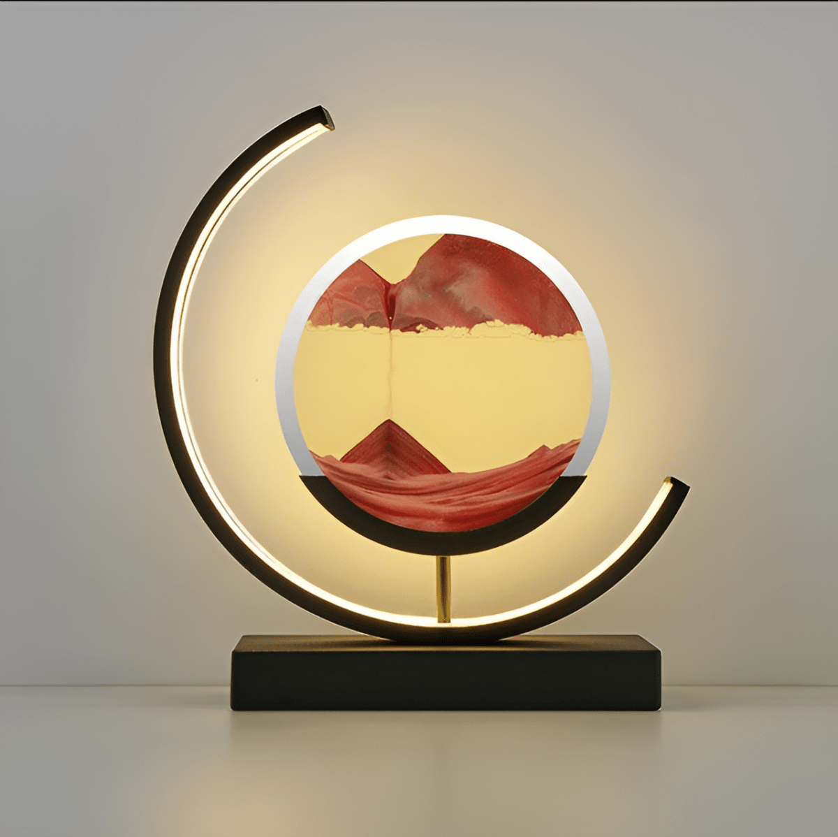 Dimmable moving sand LED lamp with circular red sand art and glowing crescent ring base