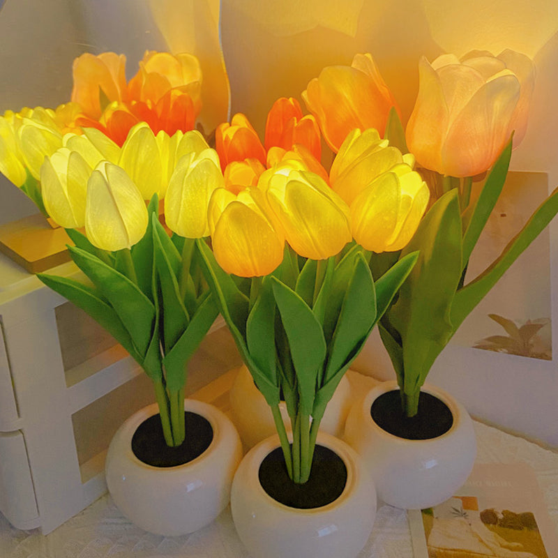 Artificial tulip night light with orange and yellow blooms in white ceramic pots