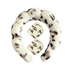 Dalmatian-style plush spa headband with two matching patterned wrist towels