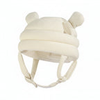 White baby helmet with bear ears on a beige background, labeled 'Rice (waffle)'.