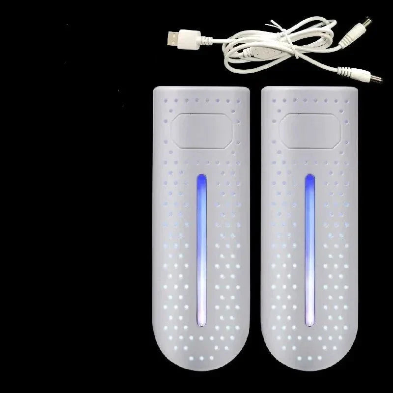 Portable shoe dryer with UV light, white pair with blue lamp glow and power cables