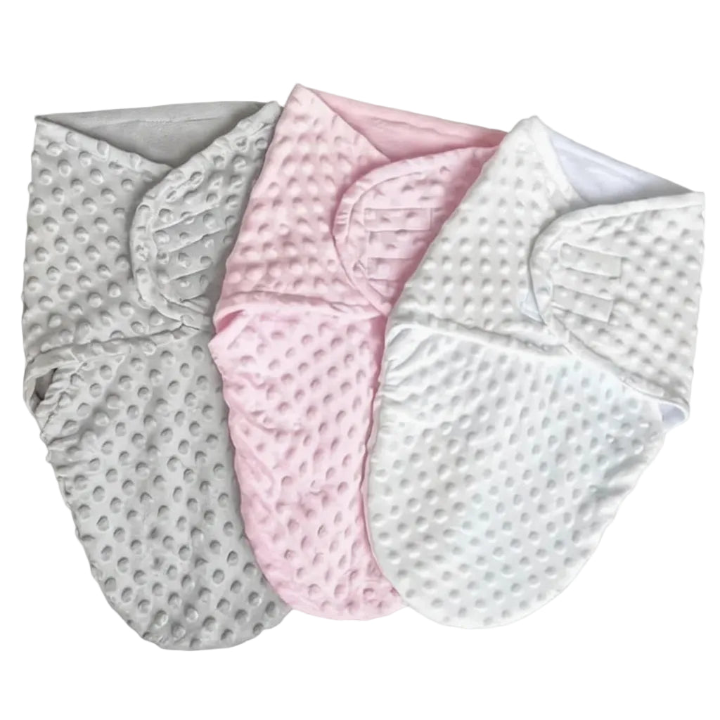 Three baby blankets in gray, pink, and white on a textured surface with 'Multiple colors' text.