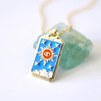 Tarot card pendant necklace with blue sun symbol card on gold chain