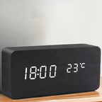 Matte black LED digital clock with white time and temperature digits on base