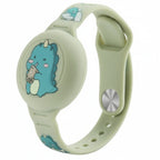 Kids GPS tracker bracelet in light green with cartoon dinosaur graphic and round face