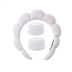 White plush flower-style headband set with two matching fuzzy wrist towels