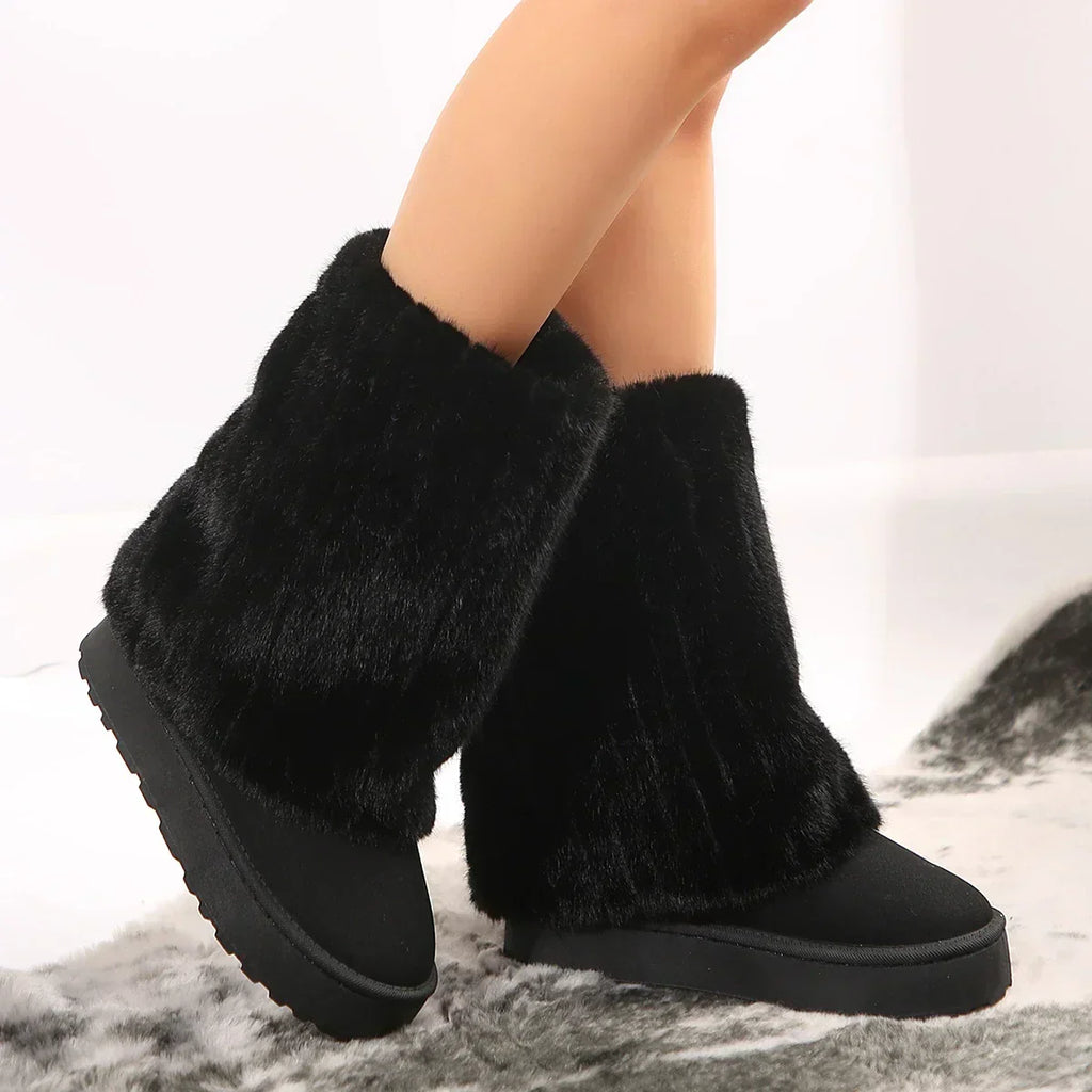 Women’s tall platform boots with plush black shafts and chunky lug soles