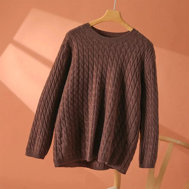 Brown textured long-sleeve sweater with crew neck and raised cable-knit design
