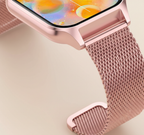 Rose gold smartwatch with pink mesh strap and close-up of touch screen edge