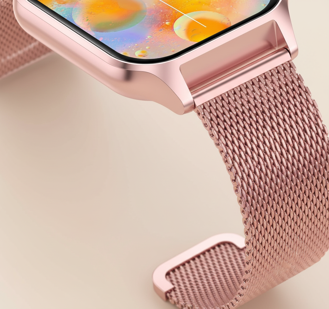 Rose gold smartwatch with pink mesh strap and close-up of touch screen edge