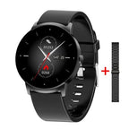Black fitness smartwatch with analog-style face, red hands and date marks, plus extra band