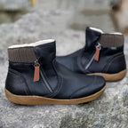 Women’s ankle boots in dark navy/black, side zipper, tan non-slip tread sole