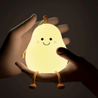Pear-shaped kids night light with smiling face, green leaf, and glowing light