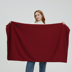Red USB heated blanket throw with zipper front, button patch, and hanging tassels
