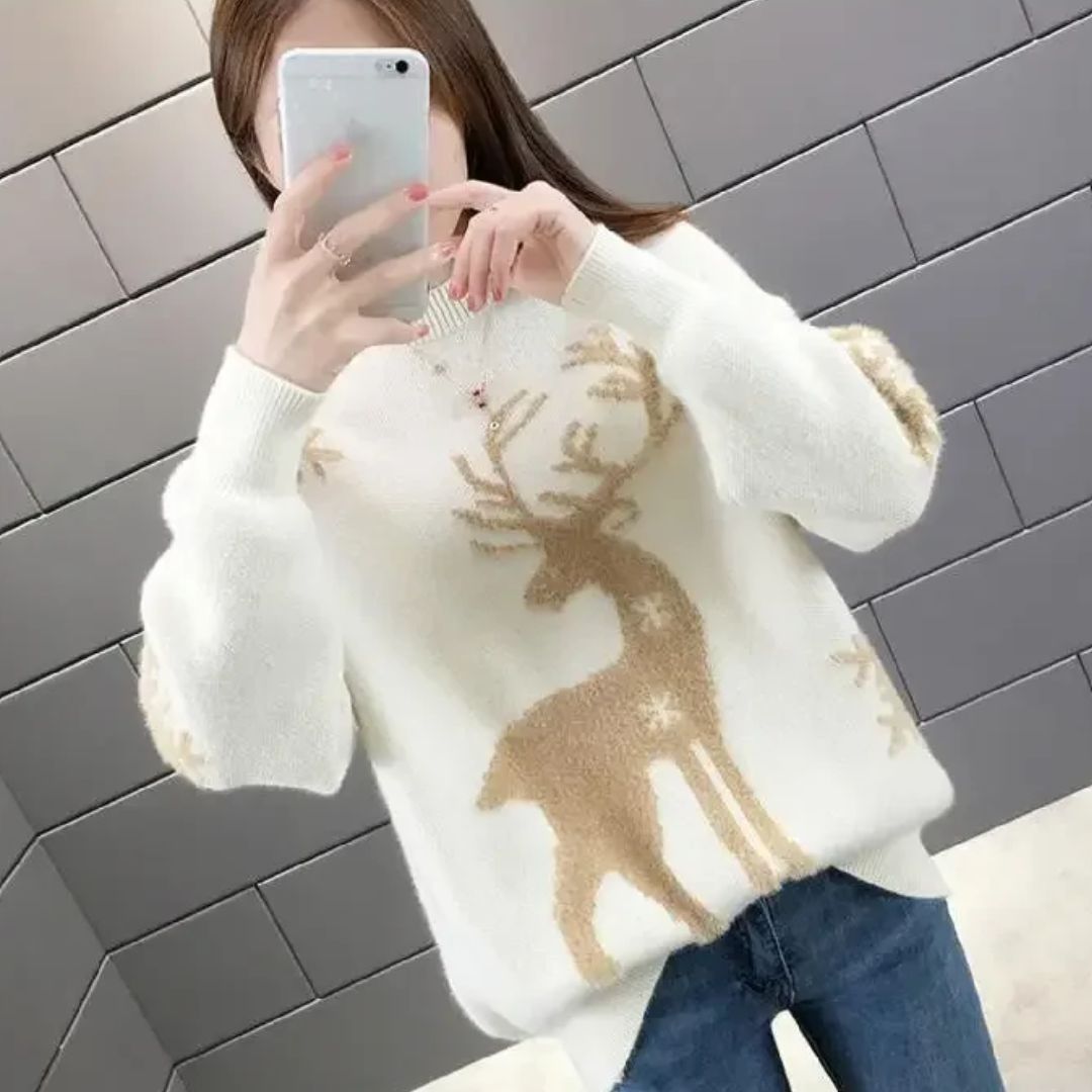 Women’s white knit crewneck Christmas sweater with tan reindeer and snowflake pattern