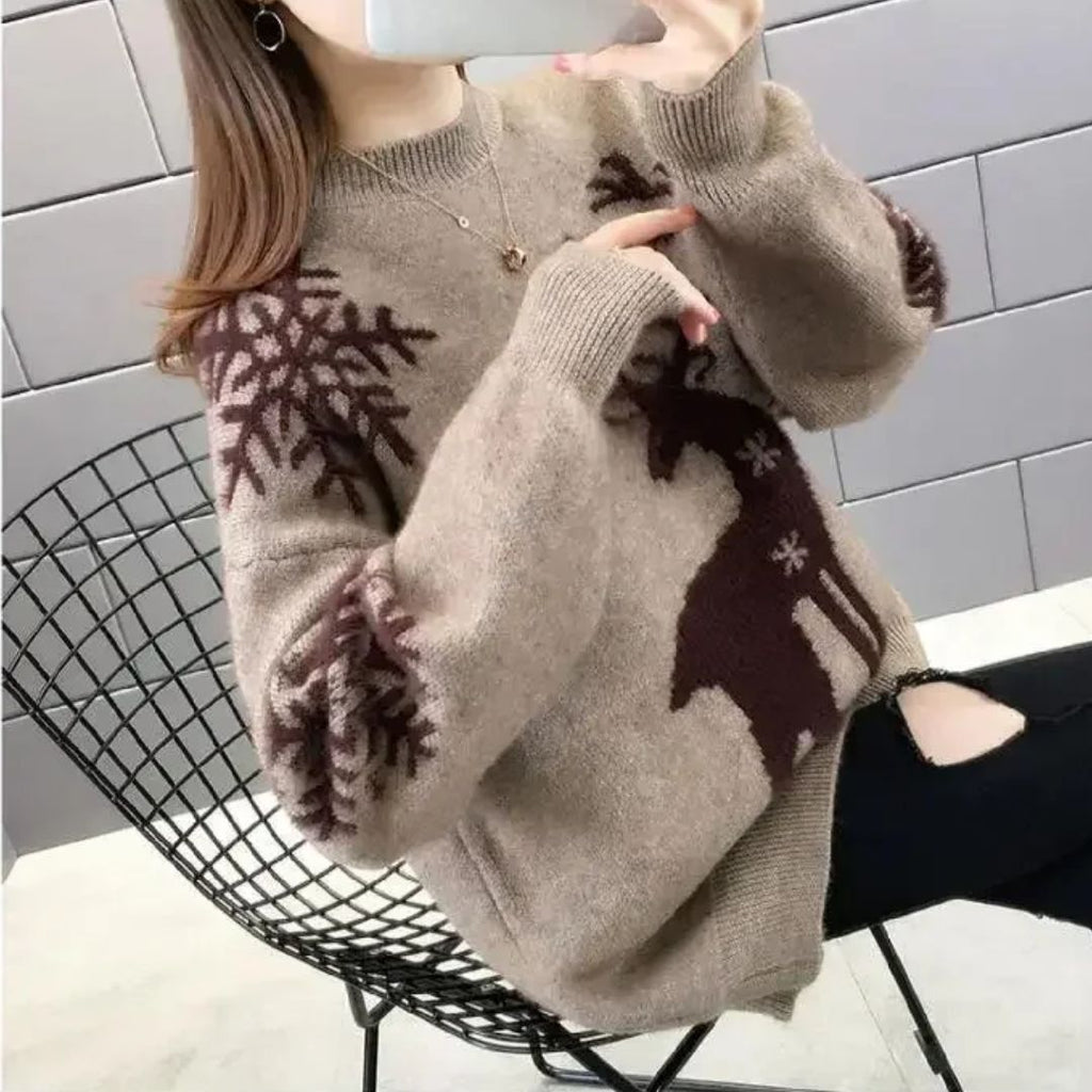 Women’s heather gray knit crewneck Christmas sweater with dark reindeer and snowflake details