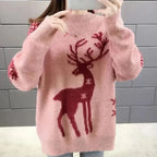 Women’s blush pink knit crewneck Christmas sweater with dark red reindeer front graphic